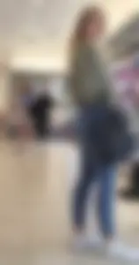 Girl wearing tight blue jeans at the store, closeups of her hot ass