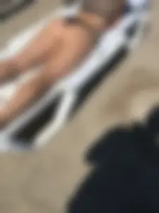Candid Girl With a Tattooed Back With a Hot Butt And Legs Lying on a Sunbed Creepshot