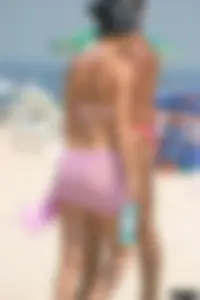 A bunch of sexy beach voyeur babes in bikinis, thongs and topless