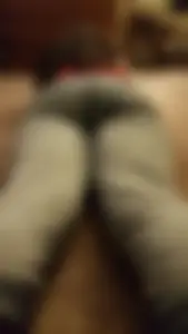 Girl in Jeans Lying on the Floor in Her Stomach Home Creepshot