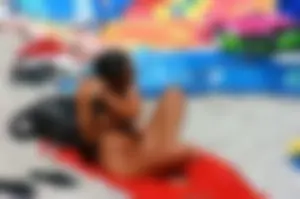 Ula FKK Sexy brunette on a nude beach topless, bottomless and with blue thong