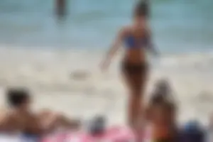 Sexy ass girl with a perfect body in her bikini on the beach