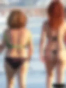 Bunch of sexy babes at the beach in thong bikinis