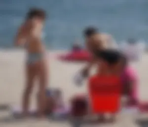 2 cute beach girls in bikinis
