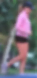 Beautiful skinny girl out for a walk in little shorts