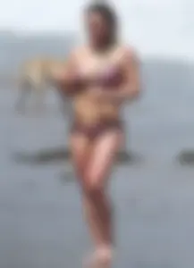 Hilary Duff in purple bikini in Malibu with a great ass and hard nipples
