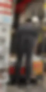 Slim clerk in tight grey jeans