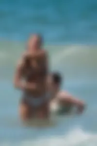 Hot ass candid beach babe in white thong bikini with camel toe
