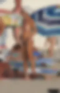 A bunch of sexy beach voyeur babes in bikinis, thongs and topless