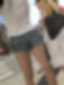Awesome ass in fringed denim shorts and perfect legs, candid girl's street photos