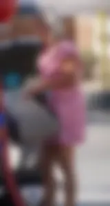 Sexy blonde upskirted in pink dress while cleaning her car
