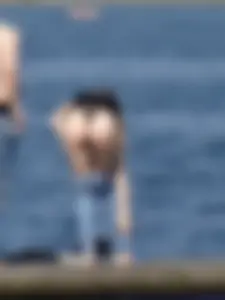 Girl on the water in black thong bikini with a nice ass