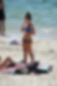 Sexy ass girl with a perfect body in her bikini on the beach