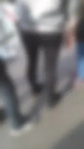 Girl wearing a black skirt over her leggings