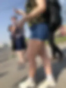 Muscular Legs And Butt in Denim Shorts - Street Creepshots Gallery on a Crosswalk