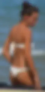 Hot girl at the beach with a nice ass in a white bikini