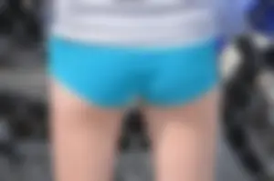 Skinny babe with a cute little ass in tiny blue shorts