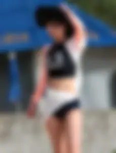 Skinny Asian milf on the beach with sexy body