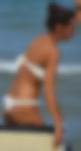 Hot girl at the beach with a nice ass in a white bikini