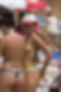 Beach voyeur girls in bikinis, thongs and topless