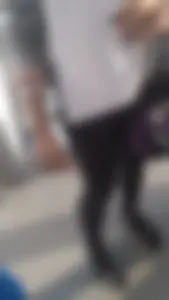 Girl wearing a black skirt over her leggings