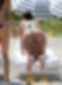 Chubby Candid Girl With A Hot Bubble Ass Bending Over a Sun-bed at a Beach Creepshots Gallery
