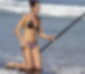 Candid surfer babes on the beach and in bikinis
