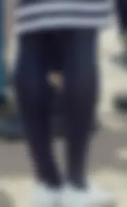 Slim legs in black pantyhose street closeups