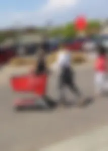 Sexy lady shopping at Target with a big ass in grey leggings
