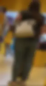 Thick brunette filling out jeans at Lego Store