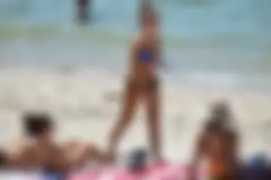 Sexy ass girl with a perfect body in her bikini on the beach