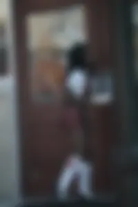 Sexy ebony Tilted Kilt employee in her uniform