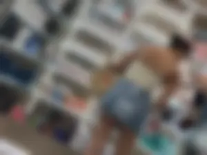 Extremely Hot Latina in Mini Skirt Showing Big Cheeks