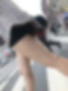 Closeups of a gorgeous girl wearing spandex mini shorts crossing the street