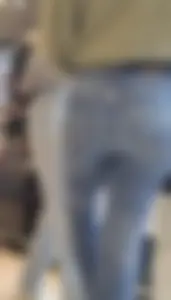 Girl wearing tight blue jeans at the store, closeups of her hot ass