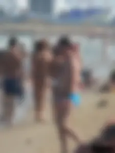 Bunch of sexy babes at the beach in thong bikinis