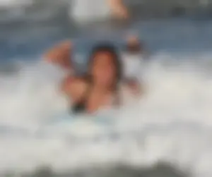 Hot surfer chicks out in the water
