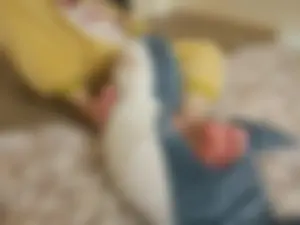 Cute girl hanging out in bed in pajamas with bare feet home creepshots