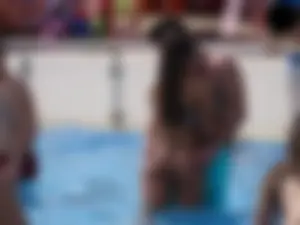 Sexy girl at the pool with a nice ass in thong bikini