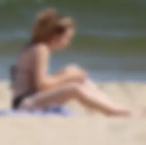 Two sexy beach teens in bikinis, one thick and one skinny with big boobs