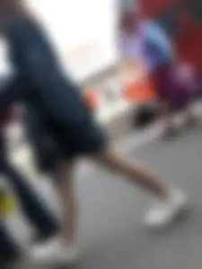 Cute candid girl in a dress at the train station