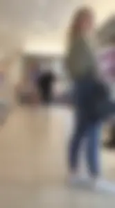 Girl wearing tight blue jeans at the store, closeups of her hot ass