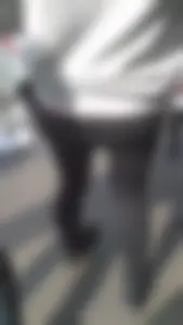 Girl wearing a black skirt over her leggings