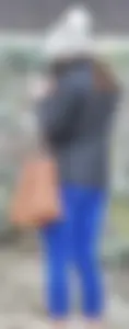 Cute girl with a nice ass in tight blue leggings along the water in San Fran