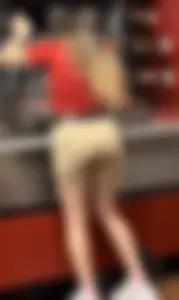 Slim Thick Wavy Haired Cutie Bends Over in Tight Shorts