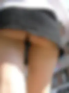 Her skirt is so short that her panties inadvertently flash