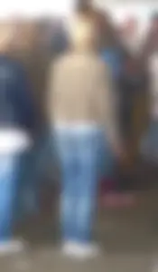 Street candid booties in tight blue jeans