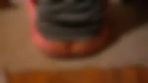 Booty Flash of a Girl Sitting on the Floor Carpet at Home Creepshot