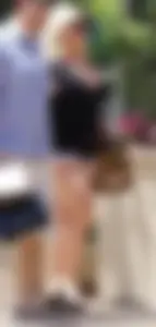 Thick blonde with big boobs in short white shorts