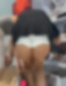 White shorts bending over